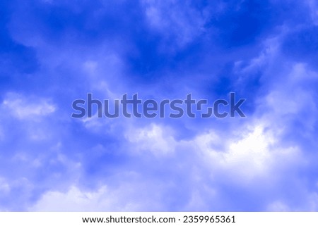 An unrealistically blue cloudy sky. Mystery, spirituality, universe. Background, abstract.