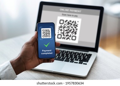 Unrecognizable afican american man scanning barcode from laptop using smartphone, closeup. Businessman hands holding phone and pointing on the qr code on screen. Internet cashless purchase, collage