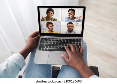 Unrecognizable Black Man In Wheelchair Using Computer At Home, Having Online Party With Happy African American People Friends Or Family, Top View, Creative Image, Communication From Home Concept