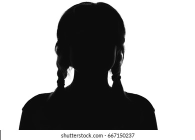 Unrecognizable Black And White Silhouette Of A Young Girl With Pigtails On A White Isolated Background