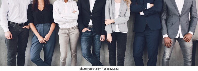 Unrecognizable Business Team Posing To Camera During Break In Office, Standing Over Grey Wall, Panorama