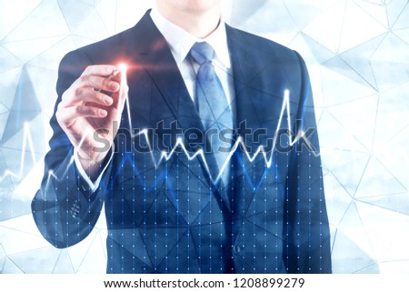 Unrecognizable businessman drawing graph with glowing pen over geometric pattern wall background. Concept of stock market. Toned image double exposure