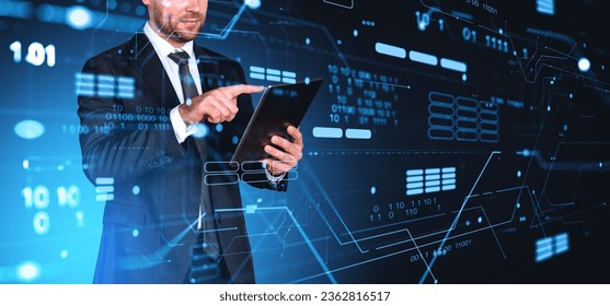 Unrecognizable businessman using tablet computer over dark blue background with double exposure of immersive data processing interface. Concept of digital technology and internet connection