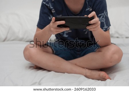 unrecognizable child using or chatting with cellular, cyberbullying, addiction generation beta. addictive