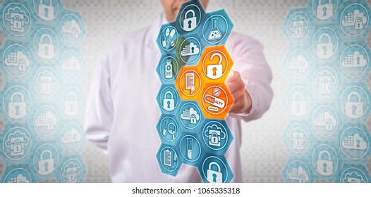 Unrecognizable Clinician Accessing Secure Document On Approved Specialty Drug. Pharma IT Concept For Access Control, User Authorization, Compliance, Lifecycle Management Of Data, Authentication.