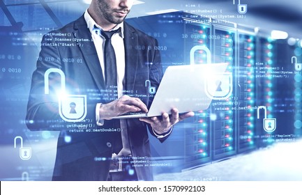 Unrecognizable computer engineer working with laptop in data center with double exposure of blurry cyber security interface and cityscape. Concept of data protection. Toned image