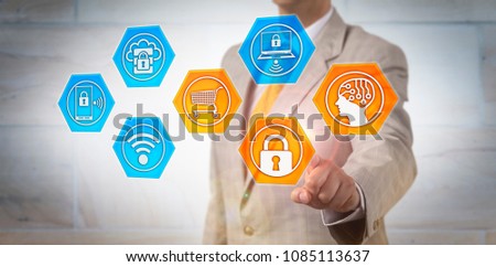 Unrecognizable corporate manager is enabling artificial intelligence and cyber security apps for online shopping. Internet concept for cyber security, AI, e-commerce, e-shop, encryption technology.