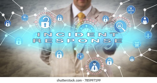 Unrecognizable Cyber Security Manager Initiating Rapid INCIDENT RESPONSE In Near Real Time. Cyber Security Concept For Mitigation Of Data Breach Via Grab-and-go Response, System Backup And Recovery.