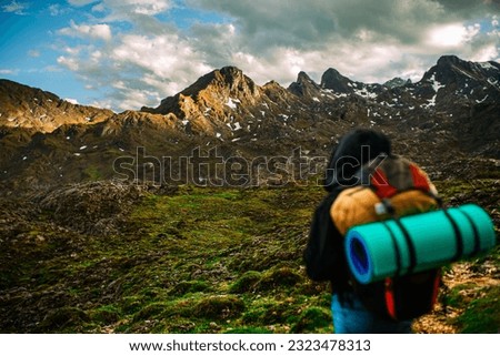 Similar – Image, Stock Photo Unrecognizable person exploring Picos de Europa at sunrise