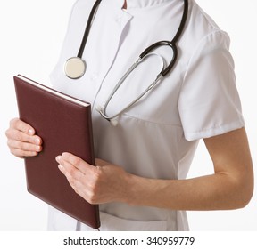 Unrecognizable Doctor Holding A Closed Book, White Background