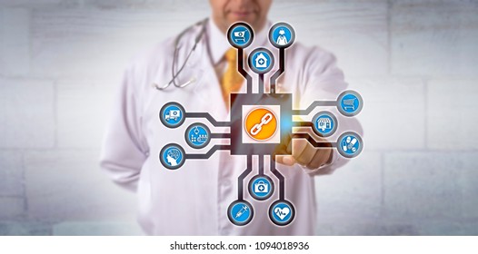 Unrecognizable Doctor Of Medicine Activates A Healthcare Logistics Blockchain App. Health Care IT Concept For Data Management Via Distributed Virtual Public Ledger Technology For Medical Records.