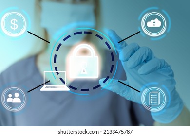 Unrecognizable Doctor Of Medicine Securing Patient Medical Records Across Multiple Devices Via A Computer Network. Healthcare IT Concept For Security Of Health Information Exchange And Data Privacy.