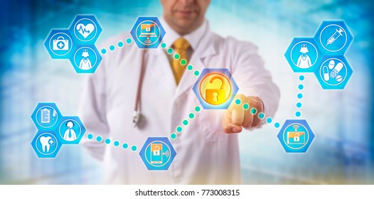 Unrecognizable Doctor Sharing Health Care Data With Medical Staff Via Networked, Secure, Mobile Devices. Healthcare IT Concept For Information Exchange, Telemedicine And Virtualization Security.