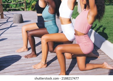 Unrecognizable Female In Active Wear Doing Exercises With Professional Trainer Keeping Body Positive Lifestyle, Cropped Women In Tracksuit Enjoying Workout Together Feeling Vitality And Flexibility