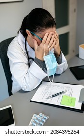 Unrecognizable Female Doctor With Pandemic Fatigue Covering Her Face