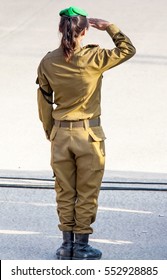 Unrecognizable Female Soldier Saluting