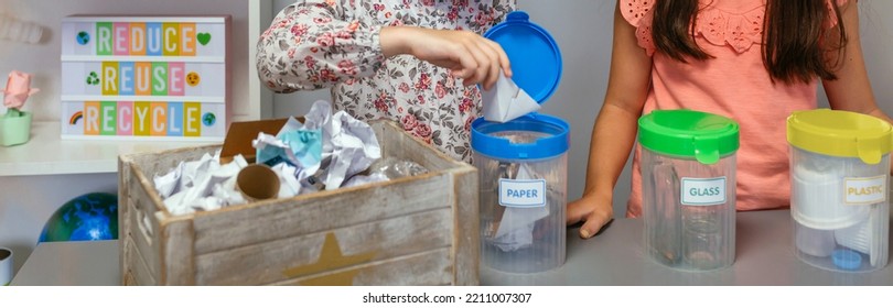 Unrecognizable Female Student Recycling Cardboard On Selective Trash Bin In Ecology Classroom