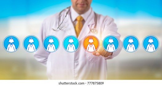 Unrecognizable Health Care Service Provider Is Selecting One Female Nurse Icon In A Lineup Of Eight. Healthcare Concept For Medical Recruitment, Staffing, Talent Acquisition And Human Resources.