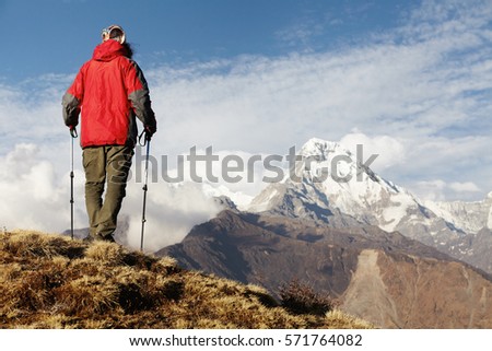 Similar – Unrecognizable traveler standing on volcano in Tenerife