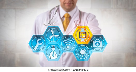 Unrecognizable Male Clinician Monitoring The Heart Rate Of A Remote Renewable Energy Engineer. Health Care Tech Metaphor For Wearable Technology, Internet Of Medical Things, IoMT, IoT, Surveillance.