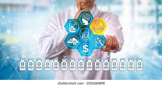 Unrecognizable Male Clinician Is Pondering Lean Manufacturing Of A Pharmaceutical Product. Concept For Serialization, End-to-end Visibility, Connectivity, Data Exchange At Scale, Supply Chain Flow.