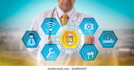 Unrecognizable Male Doctor Monitoring The Pulse Rate Of A Remote Offshore Engineer. Health Care And Safety Metaphor For Wearable Technology, Internet Of Medical Things, IoMT, IoT, Surveillance.