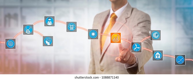 Unrecognizable Male Industry Manager Selecting A Metering Data Block In A Block Chain. Concept For Smart Energy Management And Monitoring In Renewable Power Sector Via Distributed Ledger Technology.