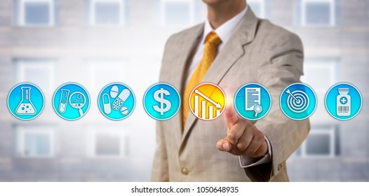 Unrecognizable Male Pharmaceutical Business Manager Is Lowering Drug Price Via Touch Screen Interface. Pharma Industry Marketing Concept For Competitive Pricing Strategy For Newly Approved Drugs.