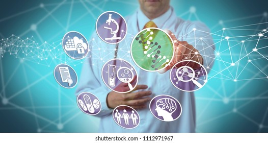 Unrecognizable male scientist using a pharmacogenomics platform in drug discovery. Concept for pharmaceuticals, bioinformatics, pharmacogenetics, DNA, biochemistry, pharmacology, genetic makeup. - Shutterstock ID 1112971967