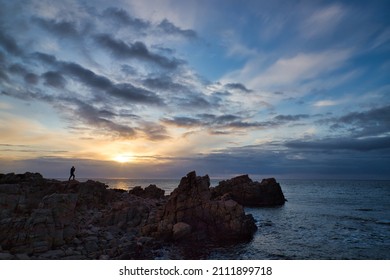 Unrecognizable Man, Sea And Dramatic Sky In The Hovs Hallar Nature Reserve, Sweden