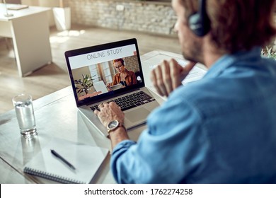 Unrecognizable man using computer while e-learning from the office.  - Shutterstock ID 1762274258
