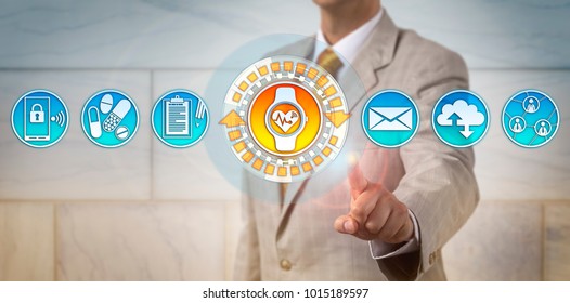 Unrecognizable Manager Accessing An ECG Application On His Smartwatch. Healthcare Technology Concept For Wearable Tech Devices, Electrocardiography, Patient Engagement, Internet Of Medical Things.