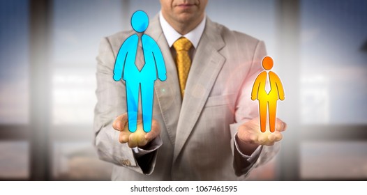 Unrecognizable Manager Comparing A Small And A Big Male Worker In His Hands. Concept For Challenge, David Versus Goliath, Inequality, Potential, Succession Planning, Competition, Favoritism, Protege.