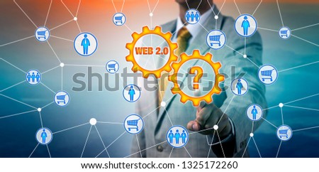 Unrecognizable marketer touching question mark in a cog wheel interfacing with web 2.0. Business and technology concept for e-commerce, social commerce, interlink between consumers, online shopping.