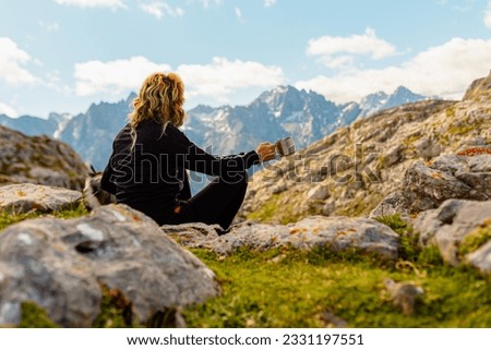 Similar – Image, Stock Photo Unrecognizable person exploring Picos de Europa at sunrise