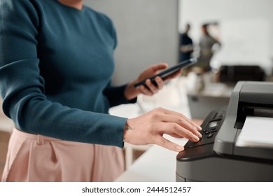 Unrecognizable Office Worker Using Printer