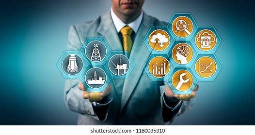 Unrecognizable Oil And Gas Executive Optimizing Well Performance Via Virtual Interface. Industry And Tech Concept For Efficient Preventive Maintenance, Use Of Digital Tools For Improved Operations.