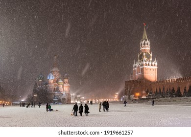 Unrecognizable People On Red Square During Snow Storm In Moscow