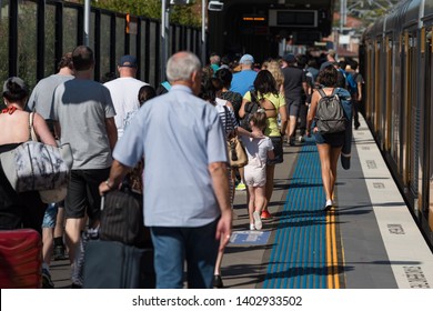 Unrecognizable People, Passengers On Suburb Train Station Platform. Real People Back View. Sydney, Australia