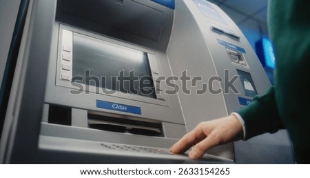 Unrecognizable Person Entering PIN Code on ATM Keypad to Withdraw Money. Error Message on Cash Machine Display About Transaction Cancellation Due to No Cash Available. Banking Equipment. Close Up.