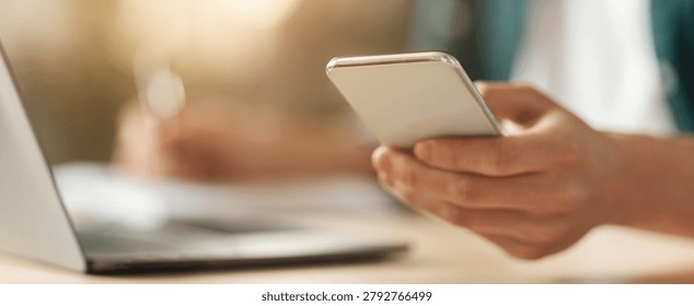 Unrecognizable Person Using Smartphone While Working On Laptop At Office, Business Concept