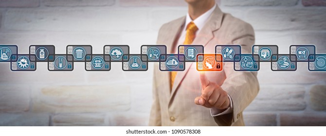 Unrecognizable Pharmaceutical Company Executive Choosing An Artificial Intelligence Data Record Block In A Drug Manufacturing Blockchain. Pharma IT Concept For Distributed Ledger Technology Via P2P.