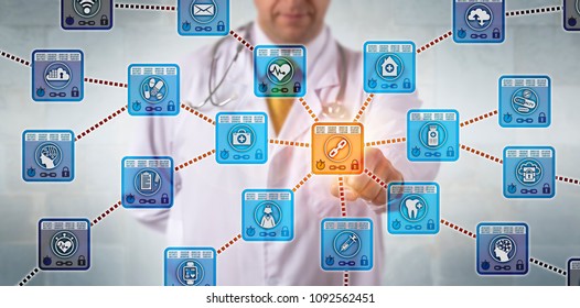 Unrecognizable Physician Is Activating A Healthcare Blockchain Application To Access Secure Medical Records. Health Care IT Concept For Data Management Via Distributed Public Ledger Technology.