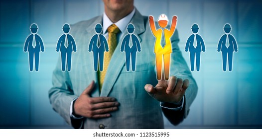 Unrecognizable Recruiter Selecting One Cheering Male Blue Collar Worker Among Seven Candidates. Recruiting Concept For Talent Acquisition, Choosing The Best, Skill Evaluation, Interview, Decision.