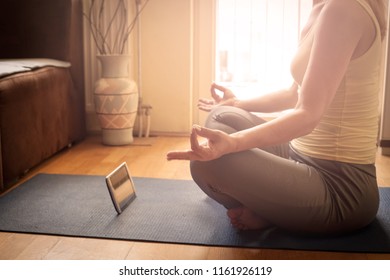 Unrecognizable Woman With Digital Tablet Using Meditation App In Bedroom .