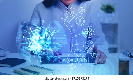 Unrecognizable woman doctor using tablet in blurry office with double exposure of covid 19 coronavirus treatment interface. Concept of 2019 ncov vaccine and treatment. Toned image - Powered by Shutterstock