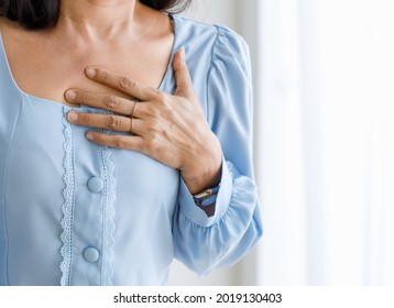 Unrecognizable Woman With Sudden Heart Attack And Hold Chest. Concept Of Emergency Health Care And Affected From Congestive Failure Or Cardiopulmonary Resuscitation, Heart Problem.