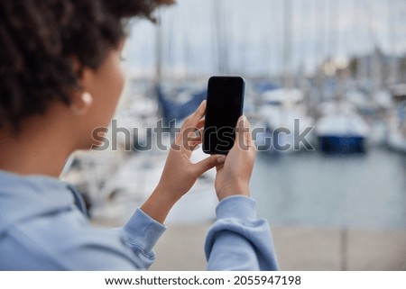 Similar – Image, Stock Photo unrecognizable woman traveling by car with her cute small dog