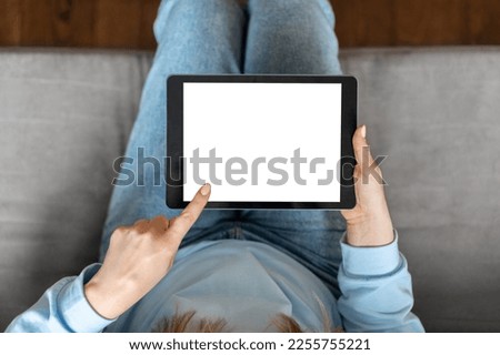 Similar – Image, Stock Photo Unrecognizable woman with tablet in deckchair on beach