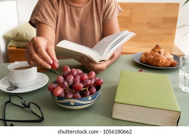 Eating while reading Images, Stock Photos & Vectors | Shutterstock